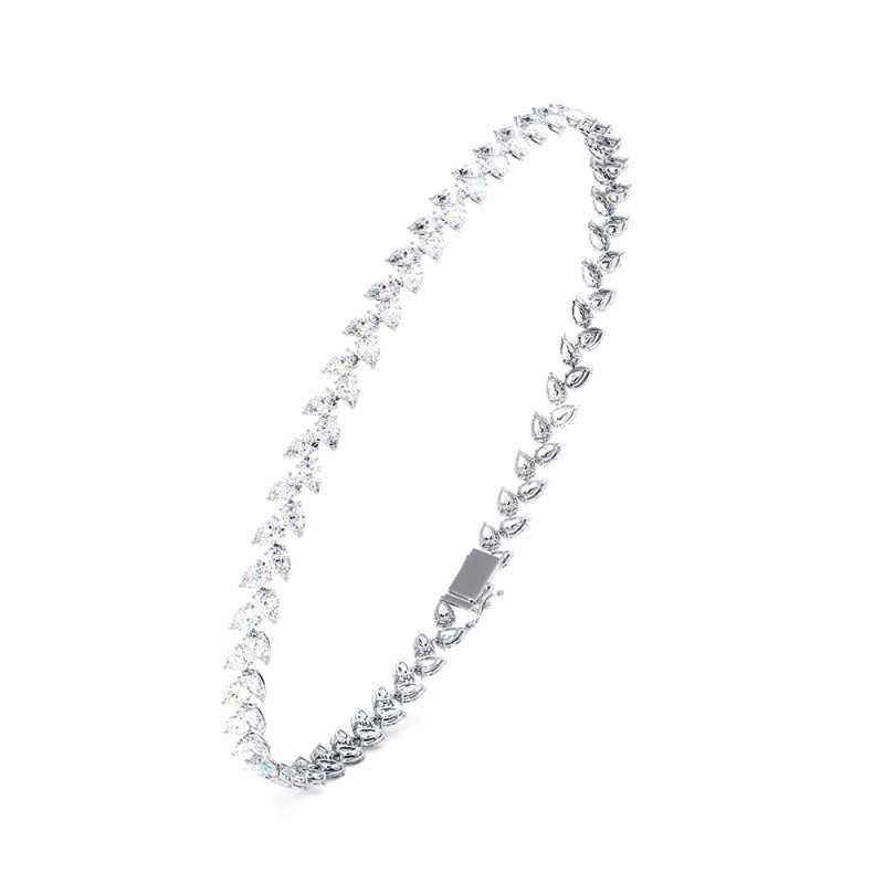 Bracelet rivière de diamants poires Haute Joaillerie en or 18K — free download