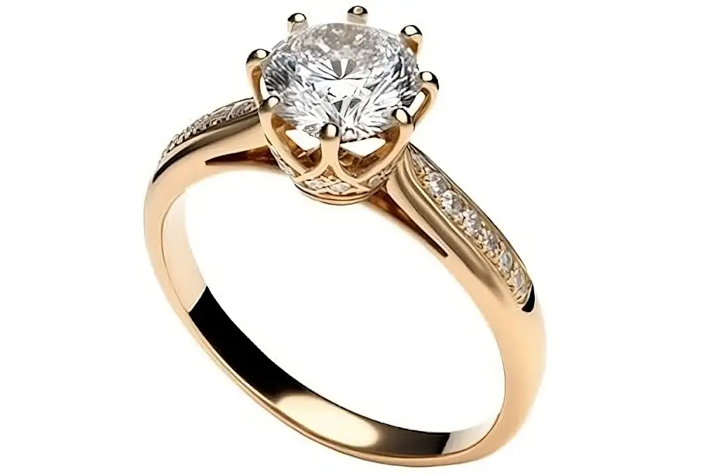 Bague de fiançailles en or rose avec un diamant taille rond serti sur 8 griffes
